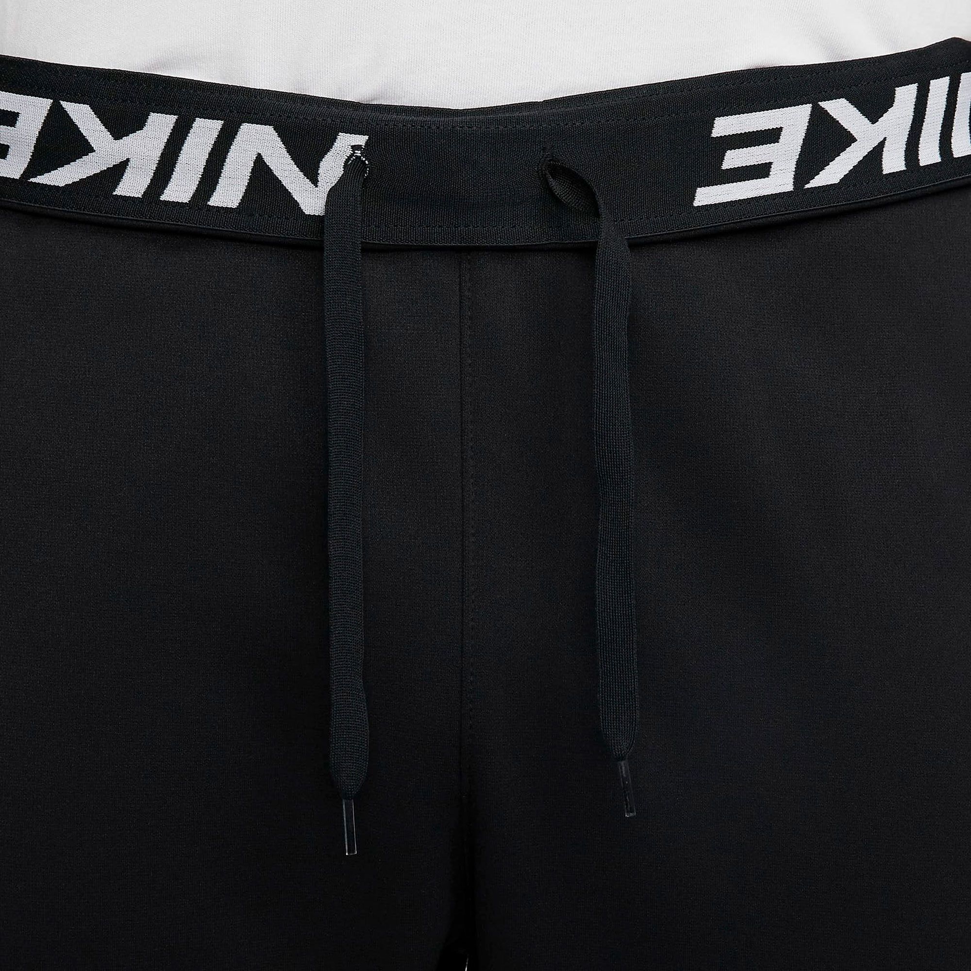 nike training tall therma tapered joggers in black