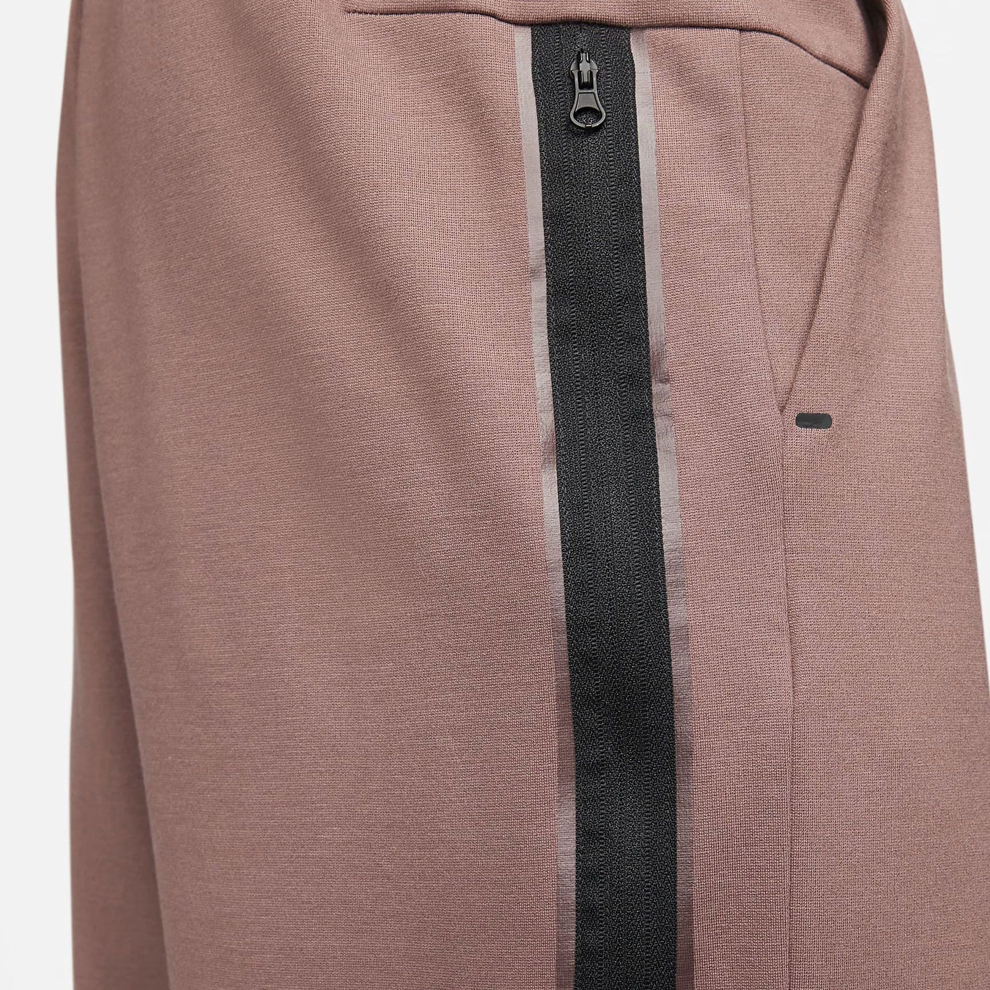 pink nike tech fleece shorts