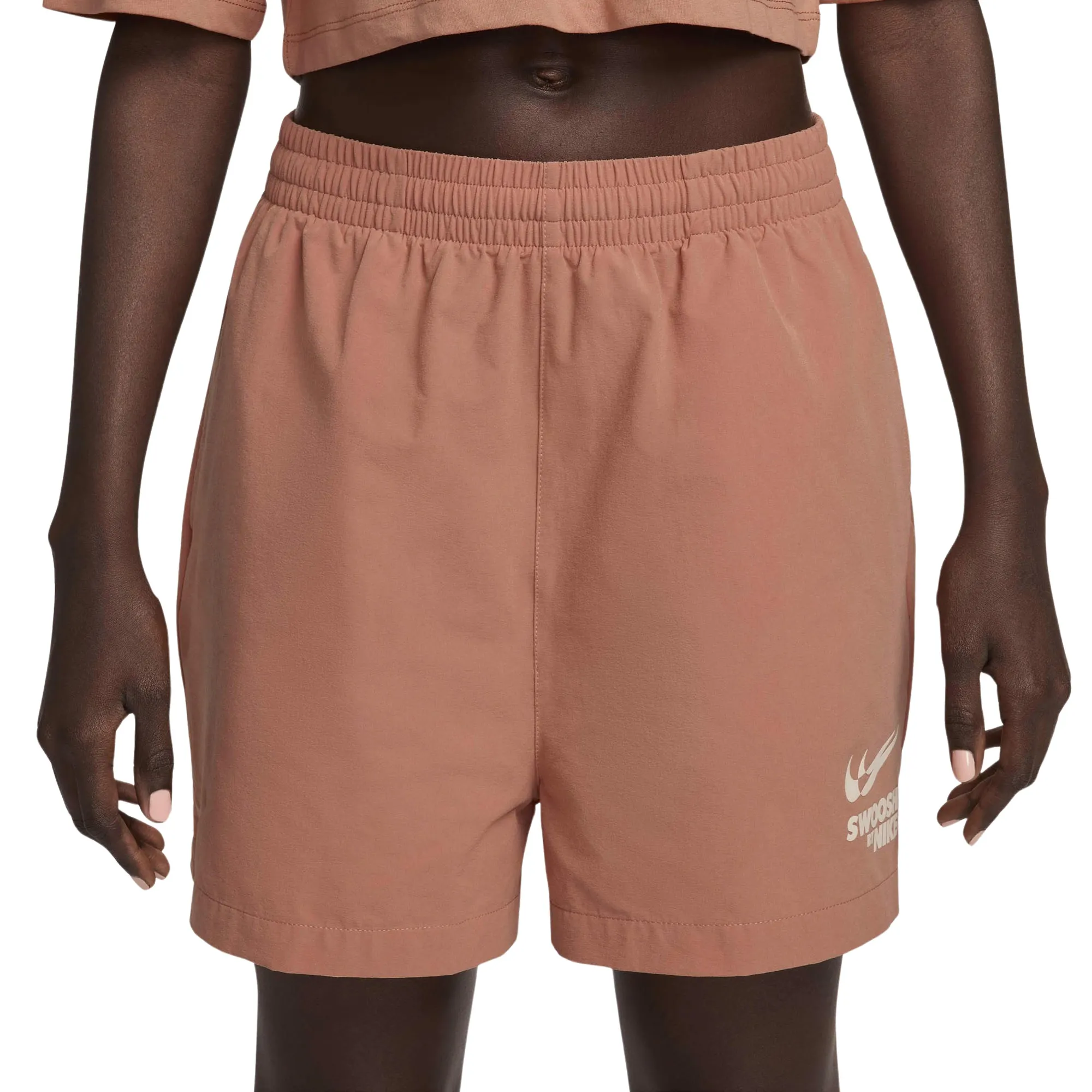 beige nike shorts womens
