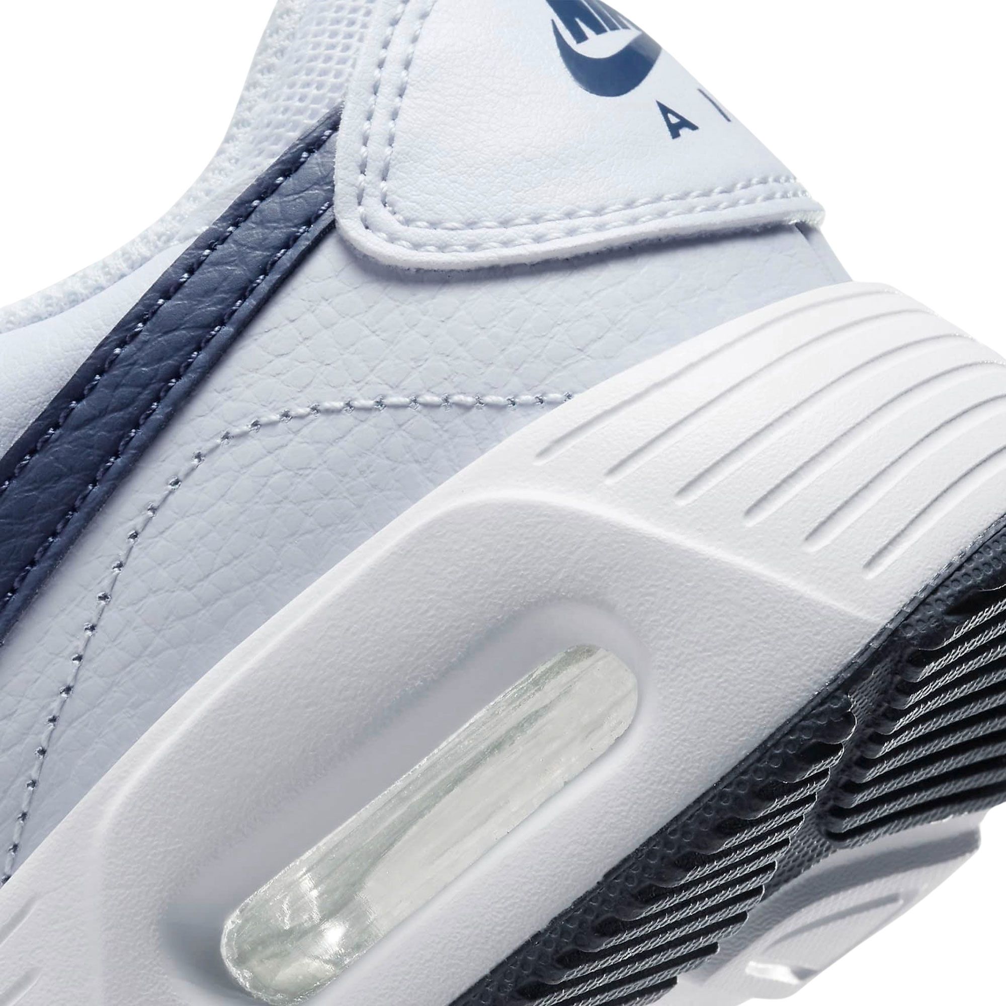 white & blue air max sc trainers